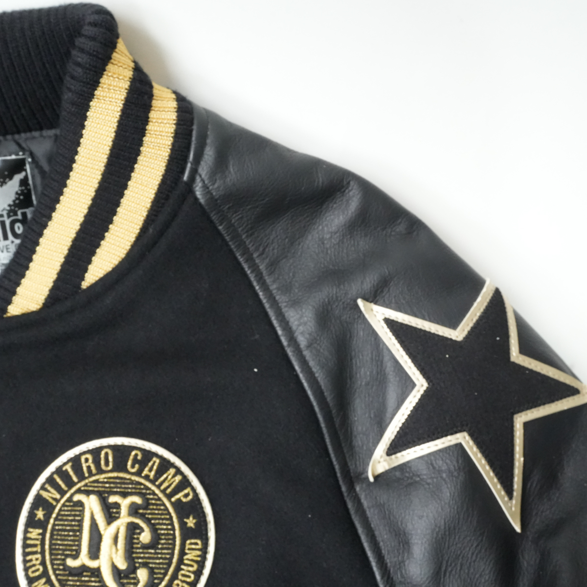 NITRO MICROPHONE UNDERGROUND 10TH ANNIVERSARY STADIUM JACKET 