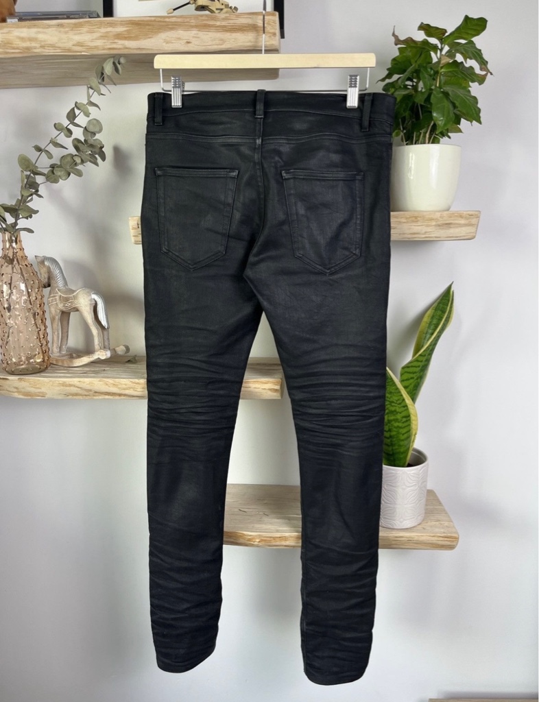 Saint Laurent black coating skinny denim sold - ARCHIVESTOCK